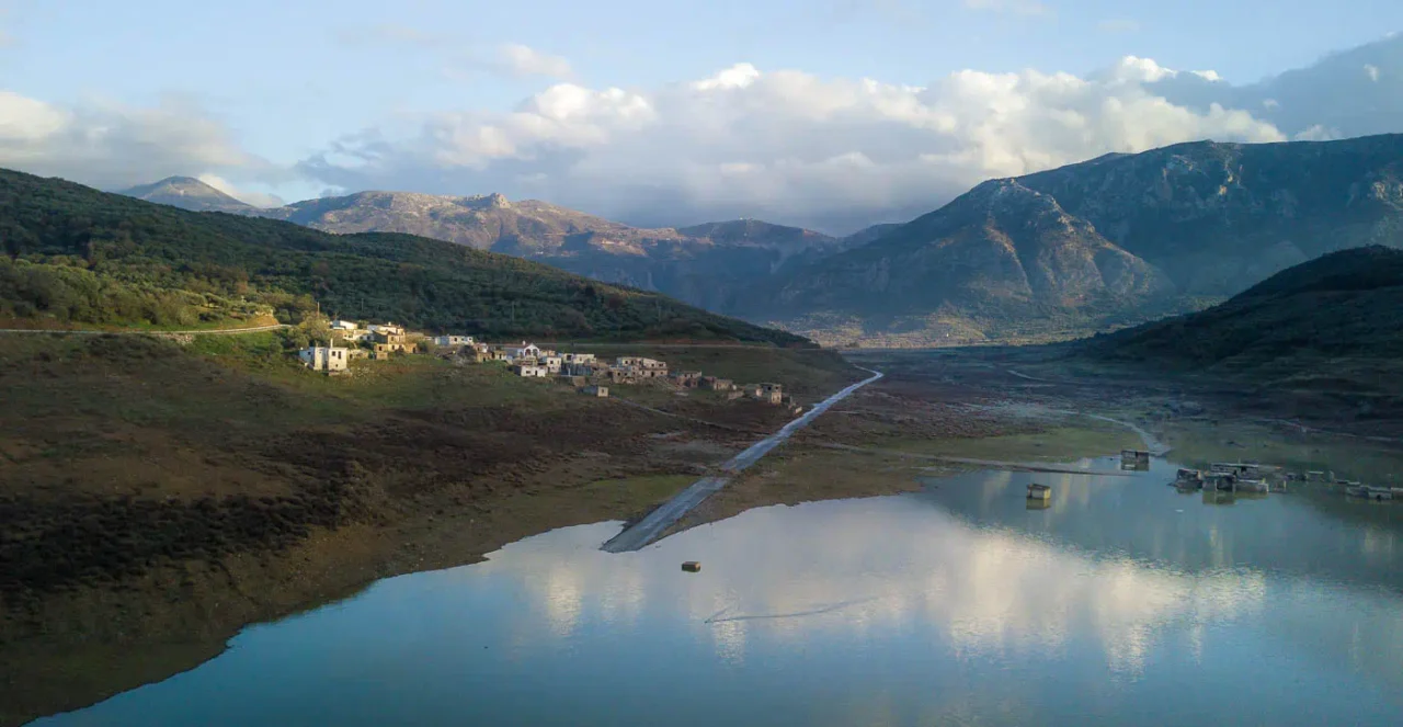 Aposelemis river dam, Sfendyli river, most of the village is visible when the water level is low. The old road to Heraklion is also visible